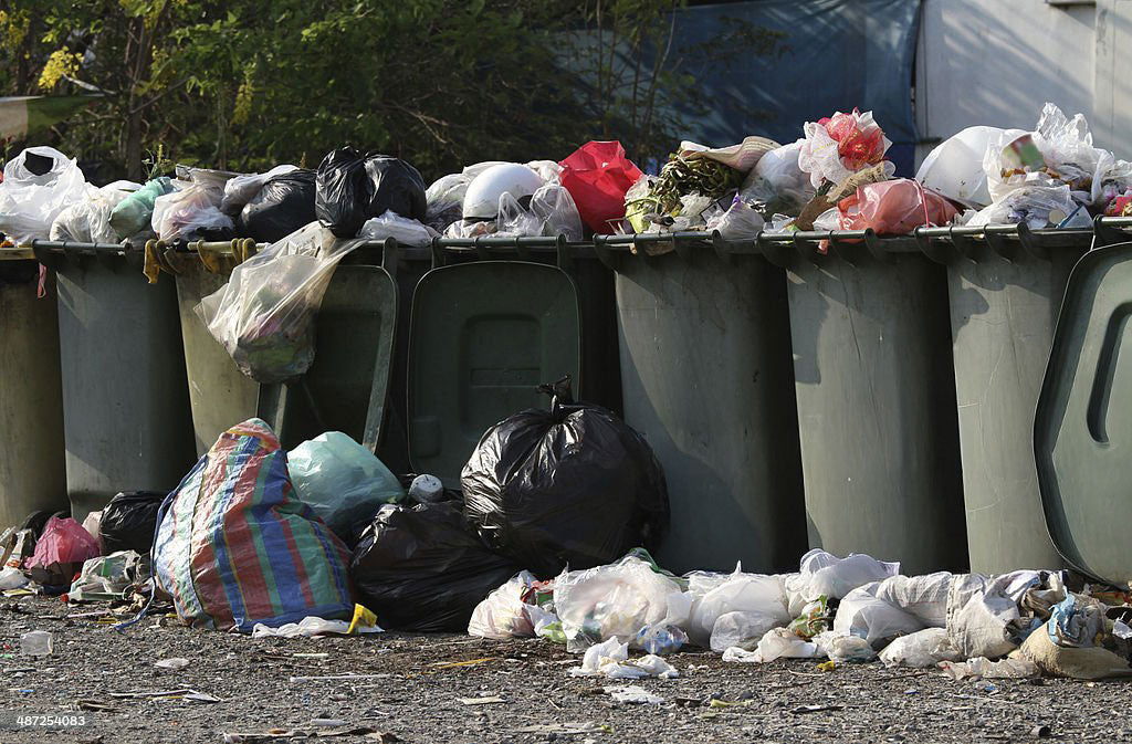 Wheelie bin rubbish spill
