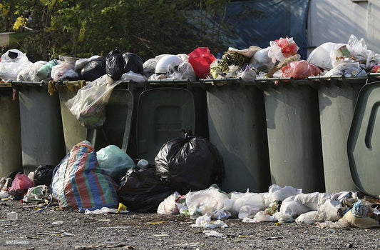 Wheelie bin rubbish spill